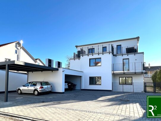 Neubau 4-Zimmer Wohnung im Erdgeschoss mit sonnigem Gartenanteil in energieeffizientem 5 Familienhaus