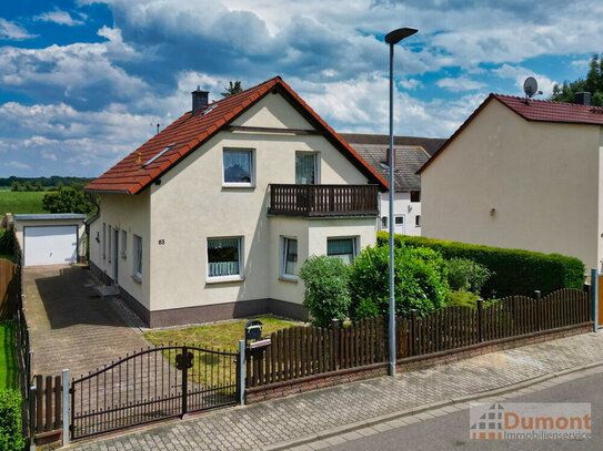 Freistehendes Einfamilienhaus mit Garage, Wintergarten und sonnigem Grundstück in Meuschau.