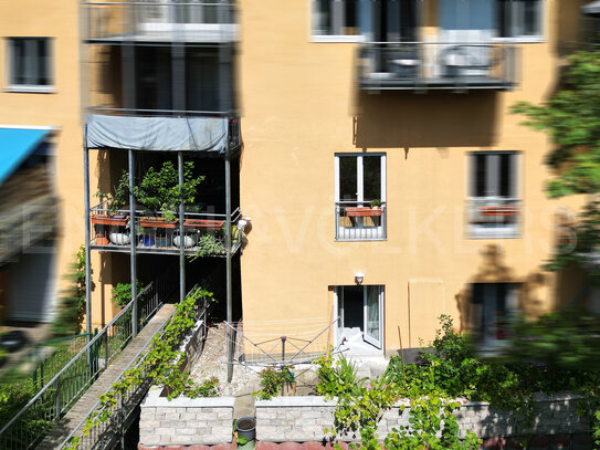 ENGEL & VÖLKERS - Idyllisches Wohnen: Zentrumsnahe 3-Zimmer-Wohnung am Bach