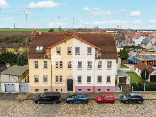 Investieren und gestalten: MFH in Lützen mit 3 Wohnungen, Garten, Garage und großzügigem Grundstück