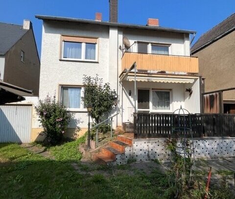 Einfamilienhaus mit Anbau in Rheinnähe mit großem Garten