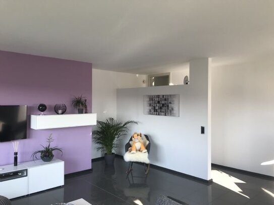 Exklusive Etagenwohnung mit Garage, Balkon und Gartennutzung