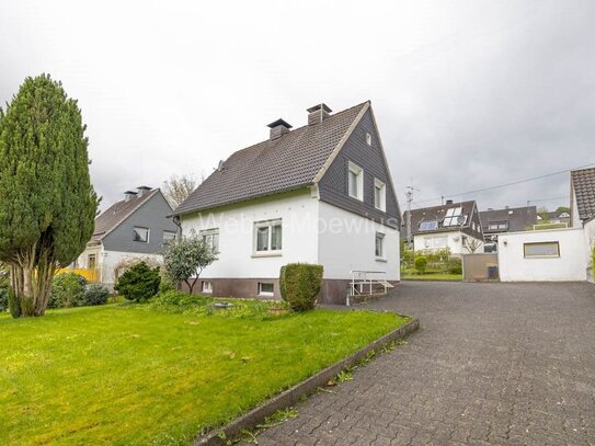 Freistehendes Einfamilienhaus (Erweiterung/Aufstockung möglich) mit Nebengebäude, Garage + Garten