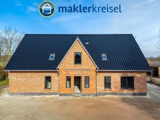 VORANKÜNDIGUNG! Ebenerdige Neubauwohnung mit Sonnenterrasse und Carport