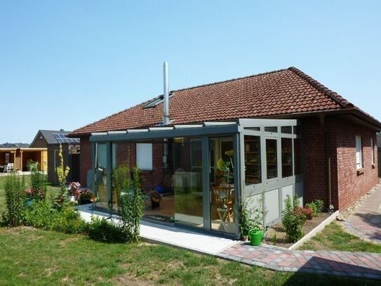 Barrierefreier Bungalow mit Wintergarten und Kaminofen