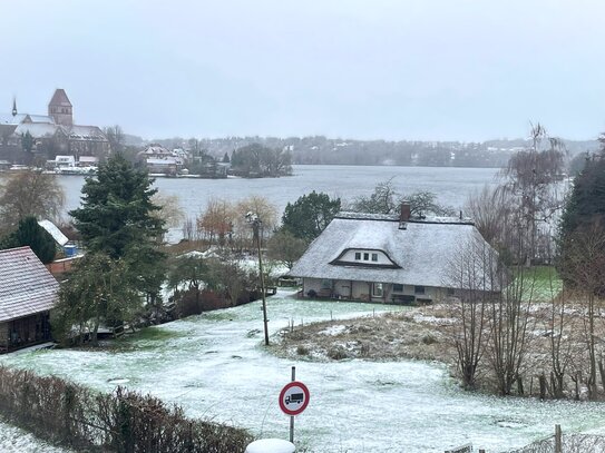 Romantisches Reetdachhaus in exponierter Seelage auf weitläufigem Grundstück/ Bauland