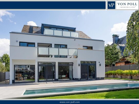 Erstbezug! Hochwertig ausgestattete Penthouse-Maisonette mit Skylineblick