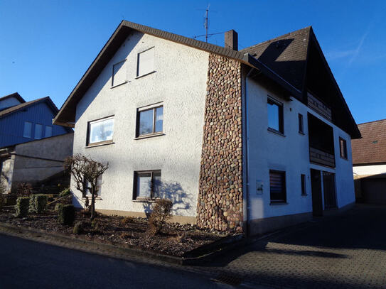 Külsheim- Steinbach: Wohnhaus mit Einliegerwohnung und großer Garage