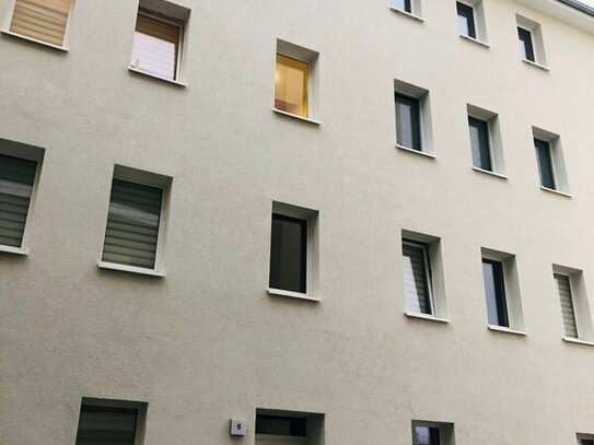 kleines Einraumappartement in der Innenstadt mit Küche