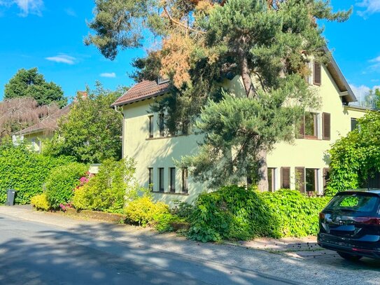 Einfamilienhaus mit separater Wohnung und schönem Garten