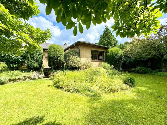 Wohnen auf einer Ebene - Ansprechender Bungalow mit schönem Garten in bevorzugter Lage