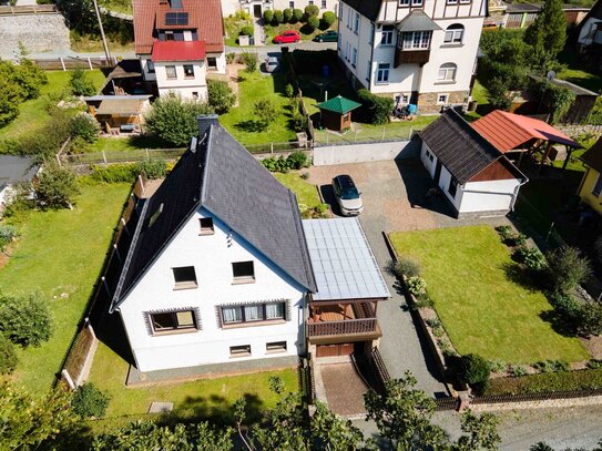 Perfektes Familienhaus mit Garage und Nebengelass in traumhafter Lage