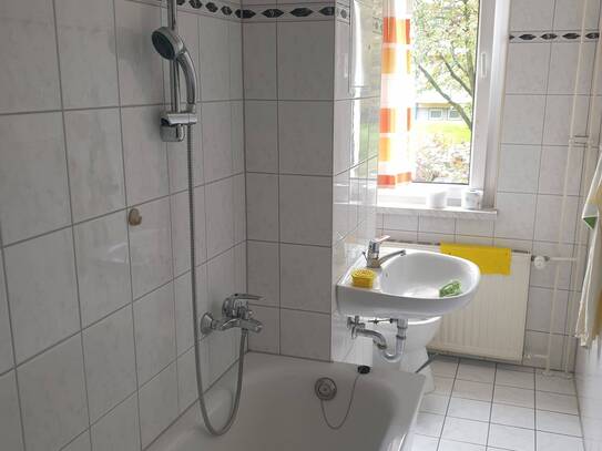 Erdgeschosswohnung mit Balkon