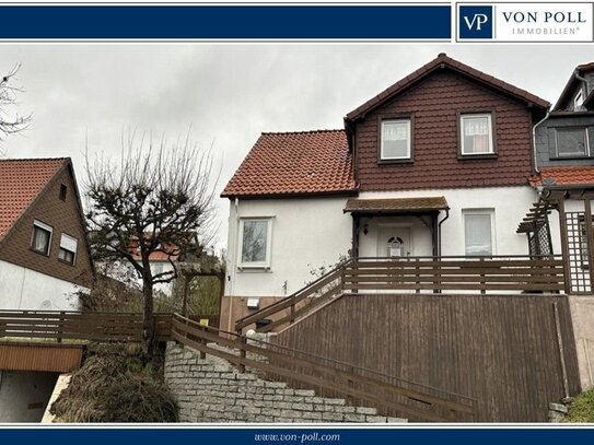 Interessante Doppelhaushälfte mit ca. 120 m² Wohnfläche, kl. Blockhaus, 2 Garagen und Garten.