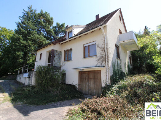 Sanierungsbedürftiges Mehrfamilienhaus mit 4 Wohneinheiten in Schalkhausen