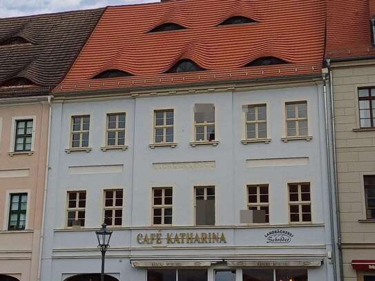 Historisches Mehrfamilienhaus mit Gewerbeeinheit im Zentrum von Torgau