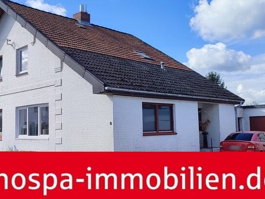 Ebenerdig bewohnbare und vielfach modernisierte Doppelhaushälfte mit Balkon und Garage!