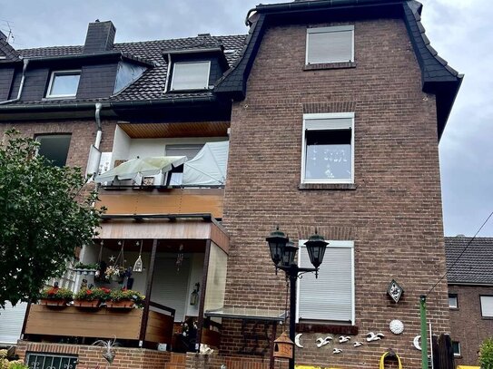 Erdgeschosswohnung mit Balkon und Garten