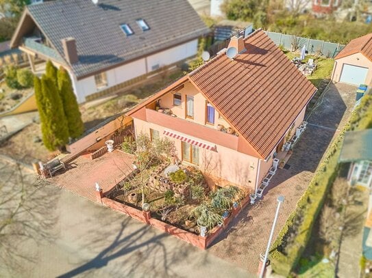 Familiengerechtes Haus mit Einliegerwohnung und sonnigem Garten in gepflegter Wohnlage!