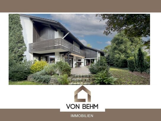 von Behm Immobilien - Einfamilienhaus im Chalet-Stil mit traumhaftem Garten