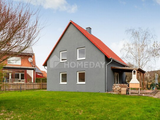 Charmantes Einfamilienhaus mit traumhaftem Garten und zeitlosem Design