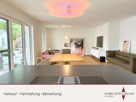 Neuwertige 3-Zimmer-Wohnung mit Designerküche, Parkettboden und Garage. TOP Energieklasse A!