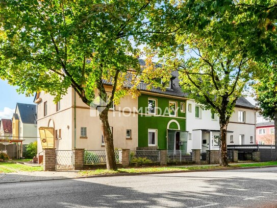 Familiengerechtes Reihenendhaus mit 5 Zimmern und Garten in renovierungsbedürftigem Zustand