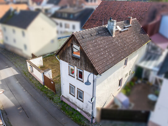 Sanierungsbedürftiges Anwesen mit großer Scheune zentral in Butzbach Nieder-Weisel