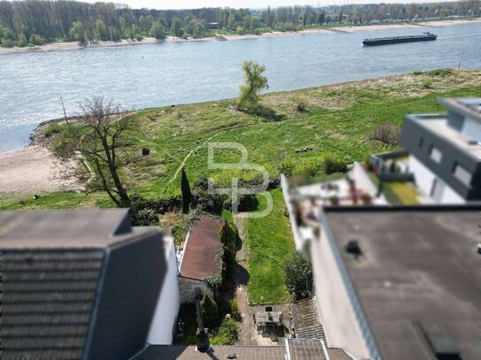 Filet-Grundstück in erster RHEIN-LAGE mit Altbestand!