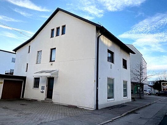 *Mitten im Zentrum* Solides freistehendes Wohn- und Geschäftshaus mit Anbau, Garten und Garage