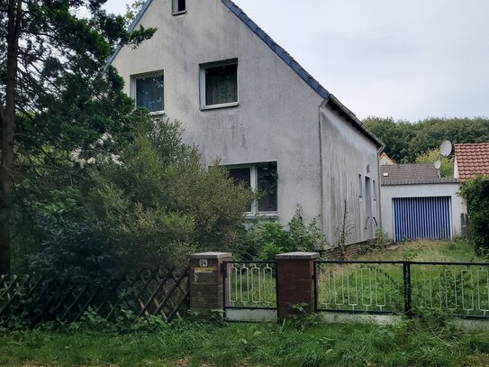 Baugrundstück mit Einfamilienhaus Sanierungsbedürftig