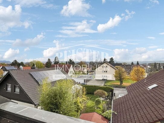 Blick über Haßfurt - Gemütliche 3-Zimmer-Dachgeschosswohnung in ruhiger Ortsrandlage