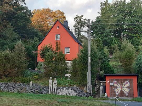 Objekt-Nr.: 05/25 - Charmantes Einfamilienhaus - evtl. als Ferienhaus / Atelier - auf großem idyllischen Grundstück in…