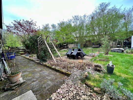 Karlsbergfreunde aufgepasst! Eigentumswohnung mit Garten, Garage und Anbau in Homburg