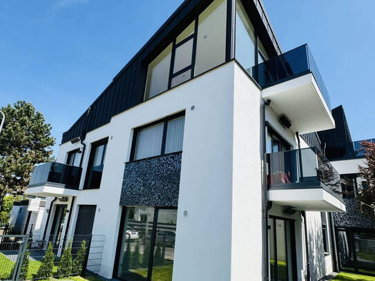 Exklusives Penthouse: Hochwertiges Design, hohe Decken, Dachterrasse und energieeffiziente Bauweise