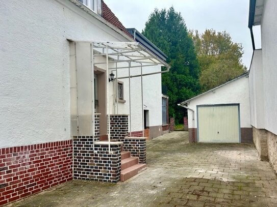 Attraktives 2-Familienhaus in zentraler Lage von Klein Zimmern – Teilsaniert mit großem Garten