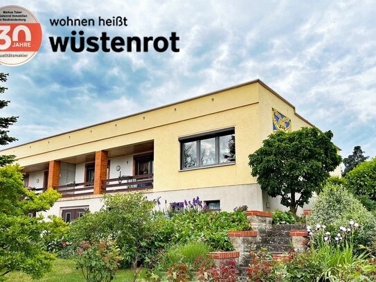 GROSSZÜGIGES WOHNEN AUF EINER EBENE MIT ÜBERDACHTEM BALKON + AUSGEBAUTEM UNTERGESCHOSS + TIEFGARAGE