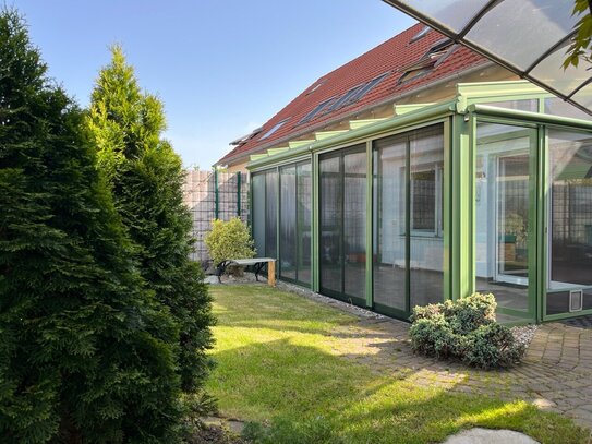 Reihenmittelhaus mit Wintergarten, Carport und viel Platz!