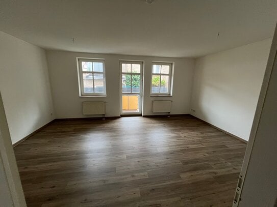 frisch renoviertes Single-Apartment mit eigener Terrasse und Tiefgaragenstellplatz