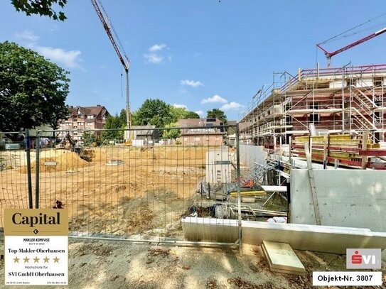 Neubau- Barrierearme Etagenwohnung mit Sonnenbalkon und Tiefgaragenstellplatz.