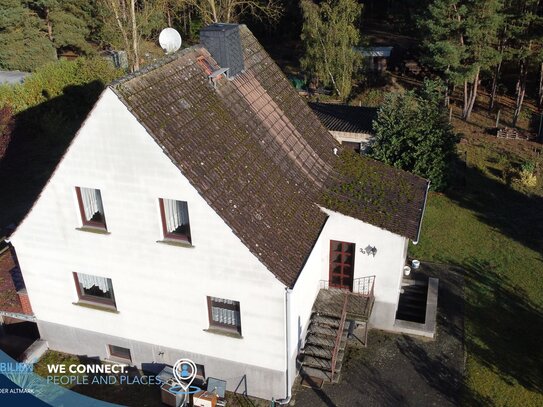 Einfamilienhaus mit großem Grundstück direkt am Waldrand