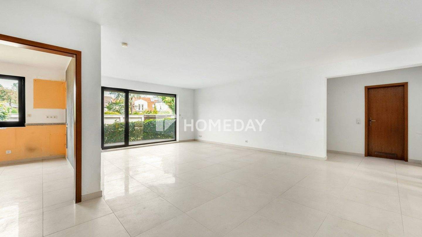 Charmante Erdgeschosswohnung mit Balkon und Gartenmitbenutzung in gepflegtem Mehrfamilienhaus