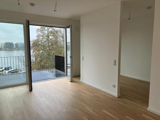 Neue exklusive 2-Zimmer Wohnung, stilvolle Küche und Balkon mit Wasserblick