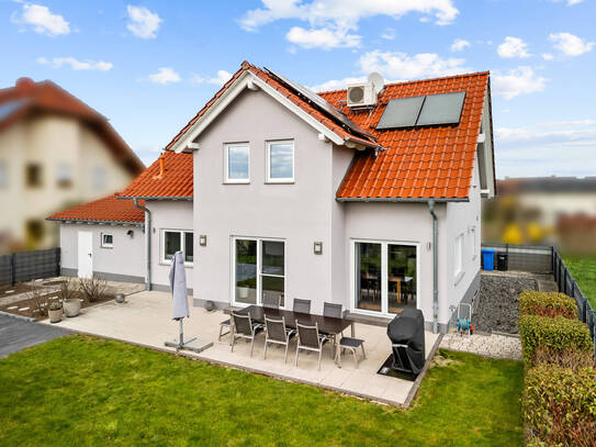 **Gepflegtes Einfamilienwohnhaus in ruhiger Feldrandlage mit viel Potenzial**