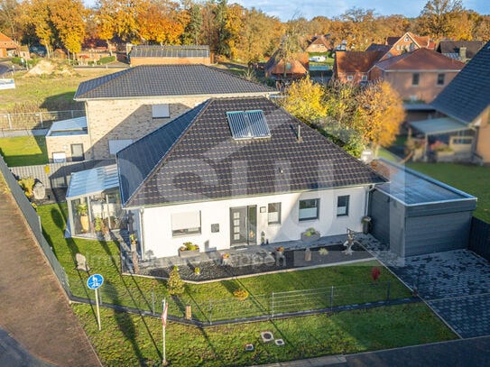 hochwertiger, top gepflegter Bungalow mit Glassommergarten und Carport mit elektrischen Rolltoren!