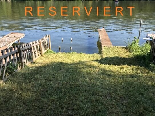 Idyllisch am Wasser mit eigenem Bootsanlegesteg