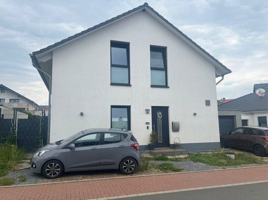 Ein familienfreundliches Einfamilienhaus mit schönem Garten wartet auf Sie!