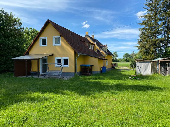 Großes Grundstück mit energetisch modernisiertem 2 Familienhaus direkt vor den Toren Münchens!