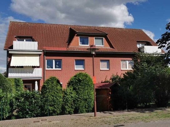 Gepflegte 3-Zimmer-Whg. in einem 6-Famhs. mit Balkon und Gartenanteil in Wolfsburg-Reisl. Süd-West