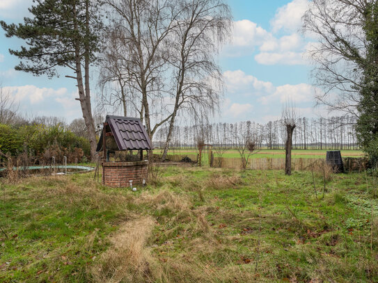 Modernisierter Bungalow mit unverbaubarer Aussicht über Felder und Wiesen!